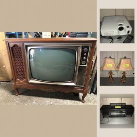 MaxSold Auction: This online auction features may books and DVD's. A Kevin Standalone snowboard. A Vintage Admiral console TV and much more!