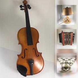 MaxSold Auction: This online auction features a wagon, violin, golf clubs, vases, accordion, camera, art supplies, vintage playing cards, sombreros, puzzles, tea sets, suitcases, guitar, dolls, comic books, wall art, music stand and much more.