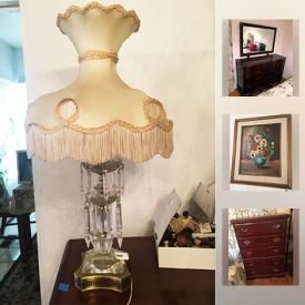 MaxSold Auction: This online auction features framed artwork, records, track tapes, piano, VHS player, collector's Barbies, flat screen TV, lamps, mobility scooter, angel statues, baseball cards and much more.