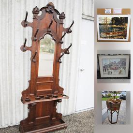 MaxSold Auction: This online auction features ANTIQUE: Gothic hall tree and cathedral lighting fixture; Victorian oak display unit; pulley and padlock. ART: Tom Thompson limited edition print "The Canoe" 555/777 with COA, vintage streetcar print of a watercolour by artist Gerard Paraghamian, watercolours, vintage oils. COLLECTIBLE: Baseball cards; Goebel; mounted model train track. VINTAGE: Furniture and much more!