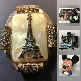 MaxSold Auction: This online auction features COLLECTIBLE: Comic books, books, toys and games, china, Fenton glass fairy lamp that is signed and numbered, Bakelite cutlery, French Ivory dresser set, Mickey Mouse bank, action figures, Beatles, Star Wars, vinyl. VINTAGE: Eiffel Tower brooch, Singer sewing machine accessories, tins/containers and much more!