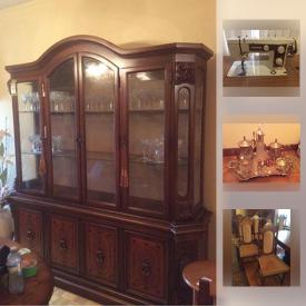 MaxSold Auction: This online auction feature furniture, glassware, Sewing Machine Table, Stand Up Ashtray, Wall Clock, Koronette stereo cabinet, TV and much more.