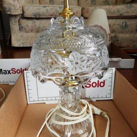 MaxSold Auction: This auction features Wingback Chairs, artwork, Sofa, Crystal, Decorative Items, Oak Table, China Cabinet, Lamps, Rocking Chair and more!
