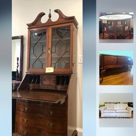 MaxSold Auction: This online auction features FURNITURE: Dining room suite consisting of a West Indian mahogany breakfront china cabinet, dining table, eight chairs and a sideboard. Console tables; a Chippendale style cherry secretary; Rowe Furniture Co. cream-colored overstuffed sofa and much more!