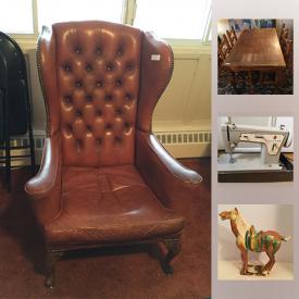 MaxSold Auction: This online auction features FURNITURE: Pine china cabinet, dining table and four chairs, sofa/side table/server; vintage leather wing chair and umbrella table. ANTIQUE: Bed warmer. Brass embossed wood box. COLLECTIBLE: Horse figurines and decor including Tang Sancai horses; African and international decor including framed photos; Franklin Mint bird plates; Royal Doulton Toby Jugs; pottery; elephants; pewter. CHINA: Six place setting of CWS Windsor "Butterfly" dishes, Severn and Ridgway pieces. Kenwood sound system and much more!