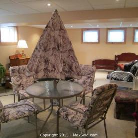 MaxSold Auction: This auction features a dark green loveseat, futon, rocking chair, bicycle, snowboard boots, bookcases, dining room table, heritage cranberry collection plates, figurinces, dressers, patio set, decorative plates, tins and much, much more!