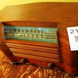 MaxSold Auction: Features dining table, dining hutch, dining chairs, side tables, crystal glassware, sterling silver, rug, couch, stereo console unit, curio cabinet, figurines, kitchen items, vintage suitcases, Hummel figurine, Vintage washing machine, Singer sewing machine, and so much more!