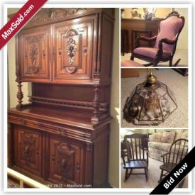 MaxSold Auction: This auction features antique rocking chair with footstool, antique court cupboard, antique hall tree with storage bench, antique Belgian confessional, two glass chandeliers, and children's furniture!