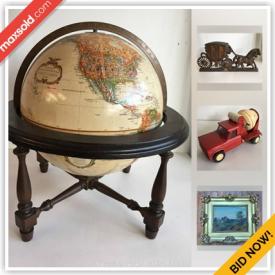 MaxSold Auction: This online auction features an Antique camera, Victorian green glass bowl. Vintage metal mantel light, figural bank; MC Nemadji pottery; a Nordmende stereo console; advertising/ephemera. Collectible Tonka, Lumar and Dinky vehicles; brass; lead figures; '99 Furby with tags; Elvis / Beatles; elephants; stamps / coins / paper money. ART such as two duck prints by Ferrara, Nathaniel Barnes artist proof, originals and handmade wood inlaid. Furniture such as a vintage enamel top kitchen table with drawers, vintage chairs. Electronics such as a Dean Markley amp, Sony and UBL speakers and more!