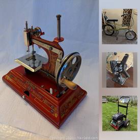 MaxSold Auction: This online auction features Mid Century Modern chairs, Toy Sewing Machine, Betty Boop Purse, Antique Movie Projector, 1970s Dragster Bicycle, Antique McFarlane Glass Washboard, 1962 Barbie Lunch Kit and much more!