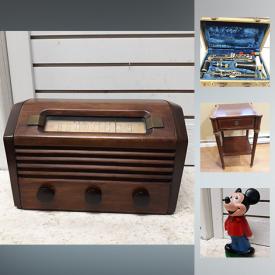 MaxSold Auction: This online auction features Kitchen equipment, Vintage Replogle Globe, Costume Jewelry, board Games, Tool kit, Tiffany and Co. Vase, African Facemask, Coleman Camping Stove, Home Tools, Tabletop radio and much more!