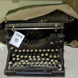 MaxSold Auction: Features 1921 US silver dollars, Singer sewing machine, Blue Mountain pottery, Underwood typewriter, Gibbard Cherry mirror, Vintage M2 Czechoslovakia tea set, Chinese black lacquer nesting table, chair, table, wash stand, binocular microscope, lamps, trunk, stained glass, book shelf, kitchen lot, DVDs, clown figurine, books, chandelier, china, art and so much more!