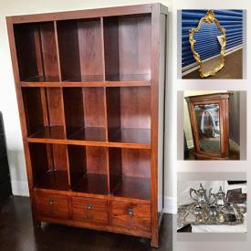 MaxSold Auction: This online auction features a wooden bookcase, chest, Ethan Allen furniture, Bombay wine rack and display case and more, china, wine glasses, Lalique, carving set, silver, Limoges, silver tea service, decor and much more!