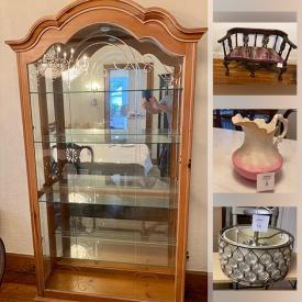 MaxSold Auction: This online auction features mirrored coffee table, Curio cabinet, porcelain pitchers, framed wall art, faux leather desk and much more!