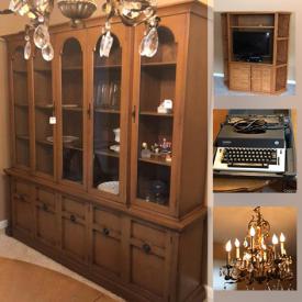 MaxSold Auction: This online auction features furniture such as TV cabinet, chair with ottoman, dining table, and Lane cedar chest, chandelier, cat tree, electronic typewriter, wall art, HP printer and much more!