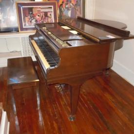 MaxSold Auction: This auction features Wurlitzer baby grand piano, hand-woven carpet, trio of jazz prints, lamps, chess set, electronics, speakers, cookware, vanity, Queen Anne style highboy, four poster bed. and much more!