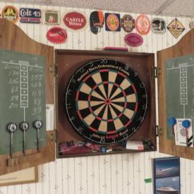 MaxSold Auction: This online auction features dartboard game with darts, linens, furniture, decors, beer steins, collectors spoons, china and much more!