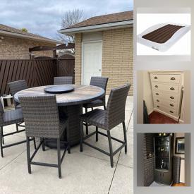 MaxSold Auction: This online auction features outside table with fire pit, bedroom furniture, wooden masks, Dyson vacuum, ski boots, toddler trampoline, sectional sofa and much more!