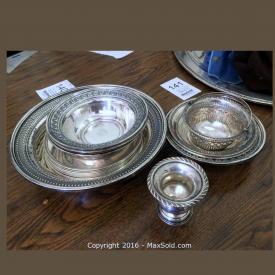 MaxSold Auction: This online auction features sterling silver, antique civil war and WWII books, model train set, camera collection, jewelry collections, piano, leather chair and ottoman, bamboo dresser and much more!
