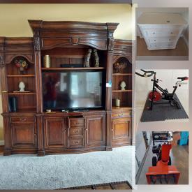 MaxSold Auction: This online auction features a bar, futon sofa bed, stools, entertainment center, secretary cabinet, convertible sofa, wooden desk, Ikea table and chairs, bookcase dresser and more, stationary bike, Waterford crystal, snowblower, beveled mirror and much more!