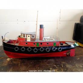 MaxSold Auction: This online auction features folk art tugboat, hand painted stained glass window, royal doulton dishes, silver plates, set of royal doulton figurines, meissen vase, victorian oak showcase and much more!