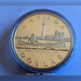 MaxSold Auction: This online auction features 1901 Canadian large penny one cent coin, WW-2 trench art coin brooch pin, 1834-1984 canadian silver proof dollar, USA million dollar reprint, 1917 Canadian silver half dollar and much more!