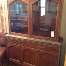 MaxSold Auction: This online auction features Malcolm china cabinet, movie camera,antique couch,signed art,rocker chair,dining table and chair, tea cups and saucers, mirror and pictures, collectibles and much more!