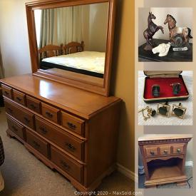 MaxSold Auction: This online auction features Leather Furniture, TV, Roxton Maple Bedroom Furniture, Toys, Keyboard, Pottery Lamp, Electric Stove Heater, Antique Pocket Watch, Decorative Native Pieces, and much more!