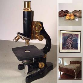 MaxSold Auction: This online auction features stained glass window, vintage trunk, vintage microscope, art glass, vintage Mersman table, leather couch, vintage jewelry, computer gear, art pottery, camera equipment, stamps, Chinese temple doors and much more!