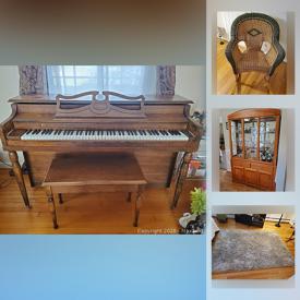 MaxSold Auction: This online auction features electric fireplace, portable air conditioner, upright piano, area rugs, fur coat, Ashley bedroom furniture, costume jewelry and much more!