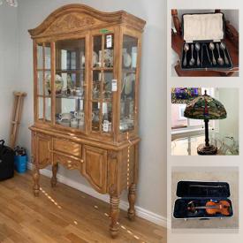 MaxSold Auction: This online auction features a vintage camera, under bed storage unit, cabinets, dishes, garden decor, small appliances, pots and pans, wall decor, lamps, wood stand, six chairs, tiffany style wall hanging, table, prints, violin, filing cabinet, desk and hutch and much more!