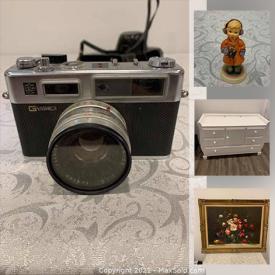 MaxSold Auction: This online auction features glass dining table, collectible teacups, cameras, children’s books, IKEA Poang chair, brown leather sofa and much more!