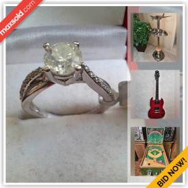 MaxSold Auction: This online auction features diamond ring, vintage pinball machine, guitars, amplifiers, vintage signs, vintage microphone, AC/DC poster, vinyl records and much more.