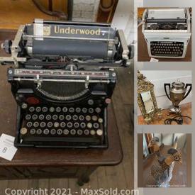 MaxSold Auction: This online auction features antique hanging mirror, antique doll & clothes, antique bed set, antique typewriters, African art and much more!