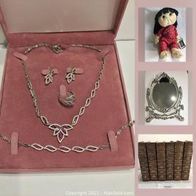 MaxSold Auction: This online auction features collectible Rice Paddy dolls, metal bar signs, vacuum, Car jack, vintage books, jewelry, Ammolite rings and much more!