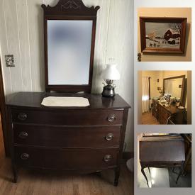 MaxSold Auction: This online auction features a whole storage locker containing furniture such as a couch, dresser, dining room table with chairs, armchairs, carpet, glassware, phonograph, costume jewelry and much more!