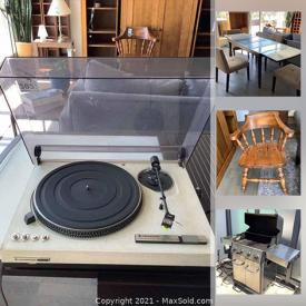 MaxSold Auction: This online auction features a dining table, chairs, wall clock, shelving units, armchair, electronics, lamps, patio furniture, barbecue grill, teacups and much more!