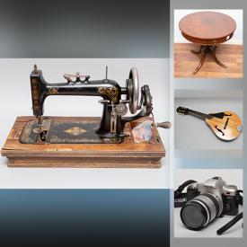 MaxSold Auction: This online auction features musical instruments, cameras, vintage lighters, Austrian microscope, signed prints, vintage Peugeot racing bikes, power tools, liquid crystal TV, antique pine furniture and much more!