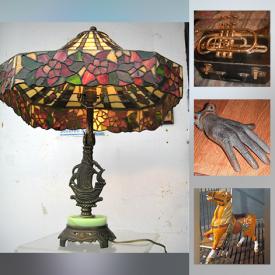 MaxSold Auction: This online auction features Stained Glass Table Lamp, Antique Etched Glass Goblets, Antique Trumpet, Art Glass, Pewter Beer Stein, Vintage Inuit Soapstone Sculpture, Guitar, Carved Quebec Wood and much more!