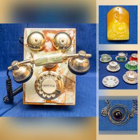 MaxSold Auction: This online auction features Amber Carved Pendants, Etched Jade Gold Gilt Spinach Panels, Porcelain Drawer Pulls, Table Lamps, Cameras, Collectible Teacups, Men's Dress Shoes and much more!