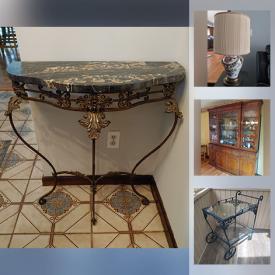 MaxSold Auction: This online auction features antique breakfront, tea cart, pottery, glassware, patio furniture, side chairs, antique birdcage, oriental lamps and much more.