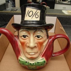 MaxSold Auction: Features Mexican figurine, Gryphonware lot, Country Inn collection tea set, stamps, coins, cooking knives, decanters, steamware, dishware, kitchen lot, art work, mirror, ottoman, sofa, patio and so much more!