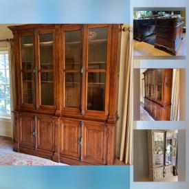 MaxSold Auction: This online auction features a Partner's desk, armoire and breakfront.