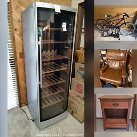 MaxSold Auction: This online auction features  Vinotemp wine fridge, crystal ware, furniture such as wood dresser, secretary desk, leather recliner, and armchairs, patio furniture, books, yard tools, camping gear, Schwinn bike, framed wall art, shelving, Barbie, fitness equipment, speakers, glassware, and much more!