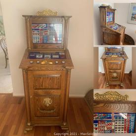 MaxSold Auction: This online auction features "Play Quarters" Red White & Blue Slot Machine.