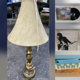 MaxSold Auction: This account features: Rock Of Ages The Band In Concert, Photos In Frames, AC DC BACK TO BLACK RECORD, Hearth Shaped Straw Basket, Decorative Flowers In Vase and more.