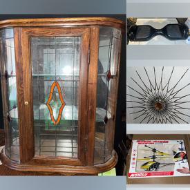 MaxSold Auction: This auction features an oak stand, watch, crystal bowl and items, phone case, curio cabinet, kitchen appliances, training collar for pets, disc player, costume jewelry, cooler bag, sewing machine, games, tools, poster, shoes, books, home decors, electronics and much more!