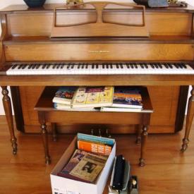 MaxSold Auction: Features piano, curio cabinet, pine display cabinet, lamp, crockery, chairs, table, bench, mirror, microwave, cutlery, art work, kitchen lot and so much more!