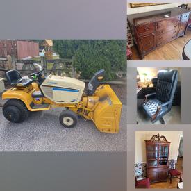 MaxSold Auction: This online auction features a vintage music cabinet, dining room chairs, table, dresser, server, picnic table, bed frame, nightstands, office chair, desk and more, vintage coins, Cub Cadet tractor, tractor cart, Sunmaster tanning bed, treadmill, pet crate, Canon printer and more!