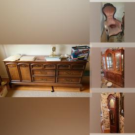 MaxSold Auction: This online auction features furniture such as a china cabinet, dining table set, side table, chairs, dresser, credenza and more, glassware, Victrola, grandfather clock, wall art, lamp, toys, vintage Lionel train set, vintage tennis racket and more!